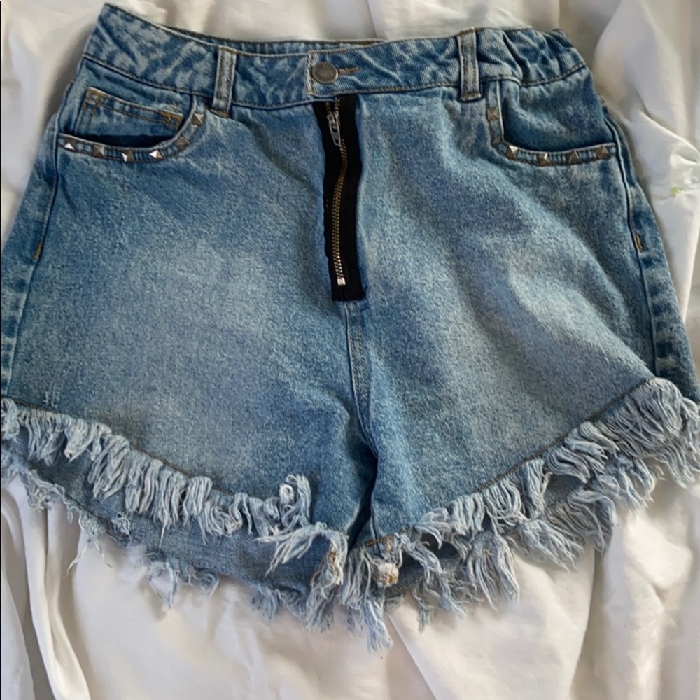 Edgy distressed jean shorts
